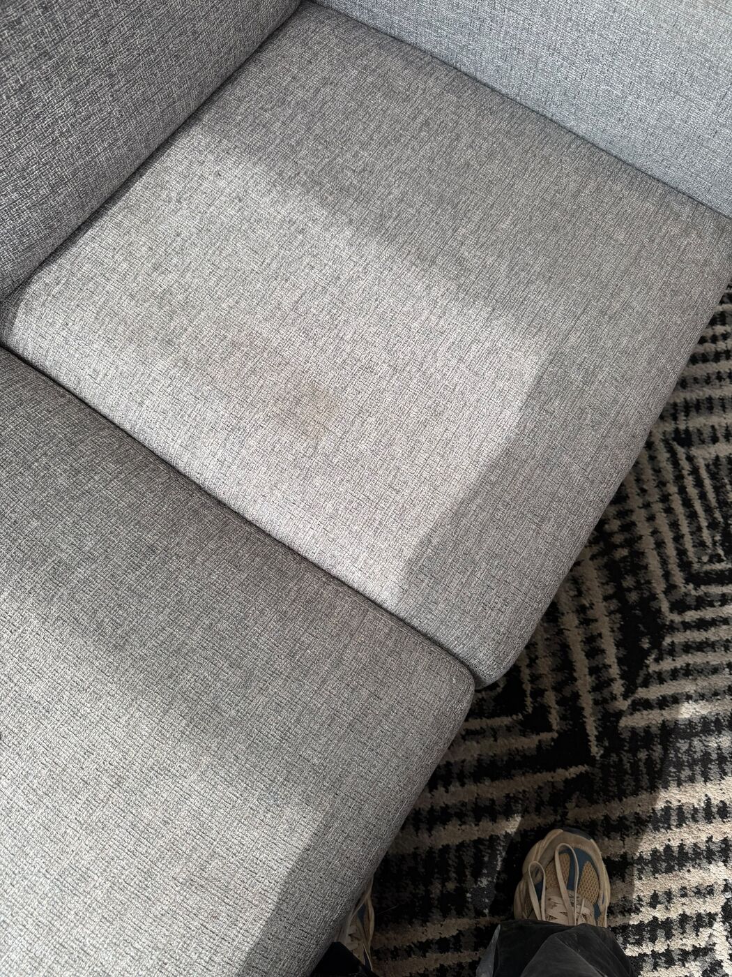 Upholstered cushion cleaning close up